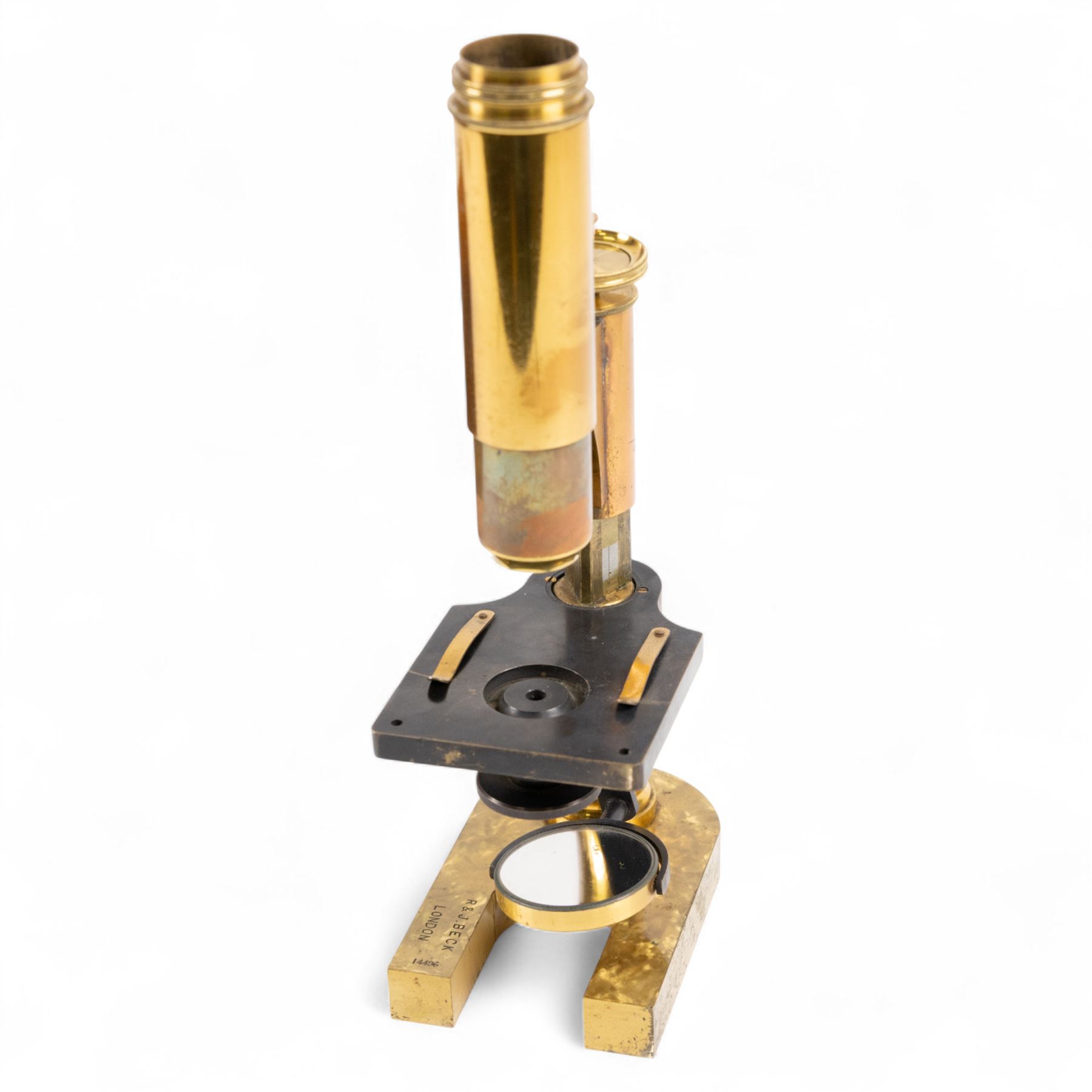 Late 19th century brass microscope by R.J Beck London, serial no. 14496, with four spare lenses in wooden case, 

By vendor repute: Microscope is believed to have belonged to Charles Darwin's youngest son Horace. It was presented to Mount House School Tavistock in 1988 by G.J Willoughby Cashell. It was given to Mr Cashell's maternal great grand father Dr Thomas Lyle whose son Mr Thomas Lyle bequeathed it to his grandson, Mr Cashell. 