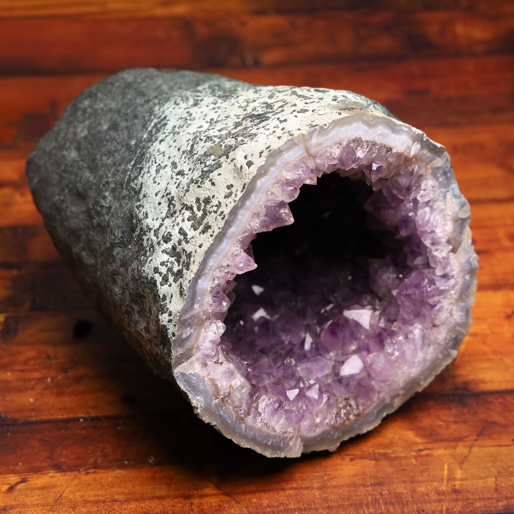 Amethyst crystal geode cluster, with well-defined crystals of various sizes, H17cm, L20cm