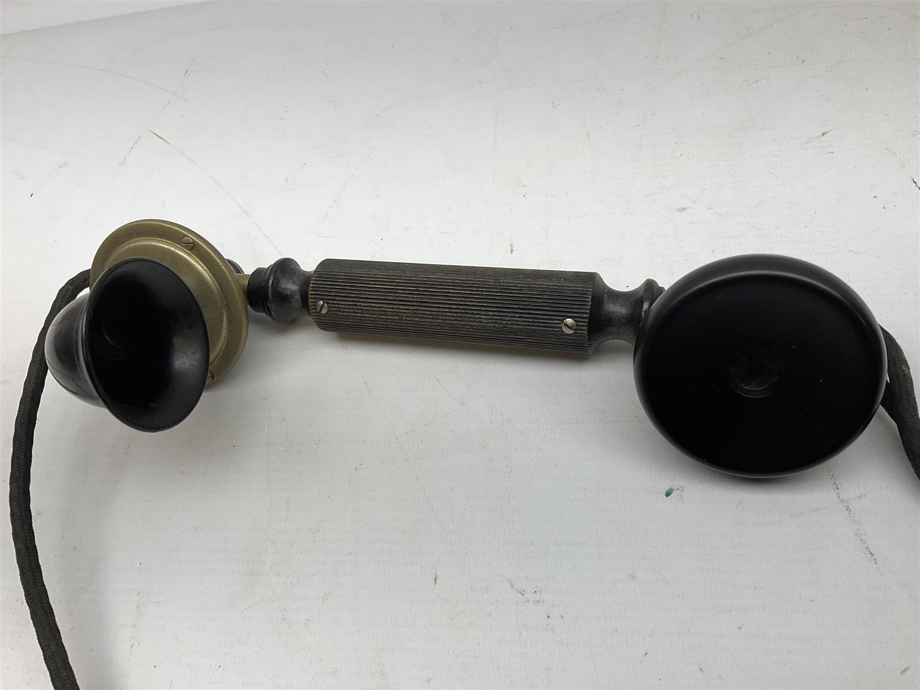 Early 20th century Danish wind up pillar telephone, together with a candlestick telephone with brass dial, wind up telephone H33cm 