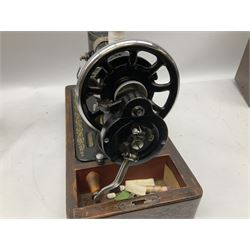 Singer sewing machine no. EA584046 in case (missing key) and Singer Manual of Family Sewing Machines