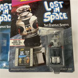 'Lost in Space' robot by Newline Productions; and three unopened  'Lost in Space' carded models; and five other robots comprising Tommy The Atomic Robot; Saturn The 13