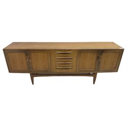 G-Plan – teak sideboard, four central drawers flanked by two double cupboards, enclosed by panelled doors 