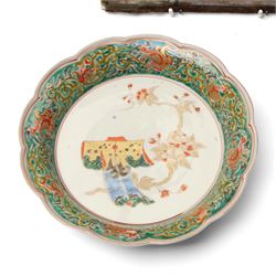 Chinese watercolour on rice paper, within a feathered surround 18cm x 19cm Asian bronze mirror, with dragon decoration D12cm Japanese dish, carved wooden bird and other items