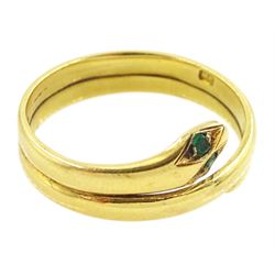 Early 20th century 18ct gold coiled snake ring, with green stone set eyes