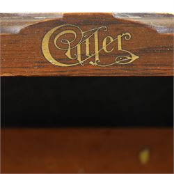 Cutler - Late Victorian oak pedestal tambour desk, the tambour shutter enclosing fitted interior, pull-out writing surface over central kneehole flanked by two pedestals each fitted with four drawers with moulded fronts, pull-out slides above, panelled sides, on moulded plinth base