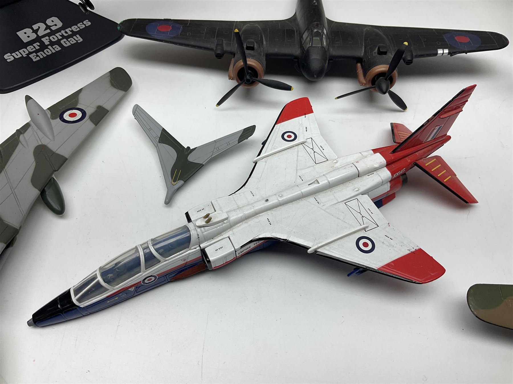 Thirteen unboxed Corgi Aviation Archive or similar die-cast models of aircraft, most with stands; Airfix 1:72 scale construction kit for BAe Harrier GR3; and two boxed Shell Collection die-cast models of cars