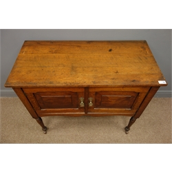  Early 20th century oak washstand two panelled doors, stile turned supports, W91cm, H76cm, D43cm  