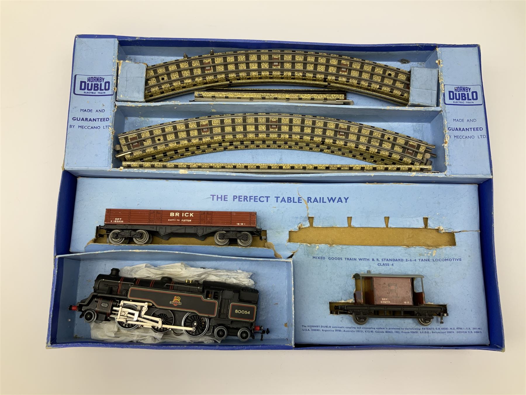 Hornby Dublo - three-rail EDG18 Tank Goods Train set with BR black 4MT Standard 2-6-4 tank locomotive No.80054, one open wagon, brake van and quantity of track, boxed with instructions.