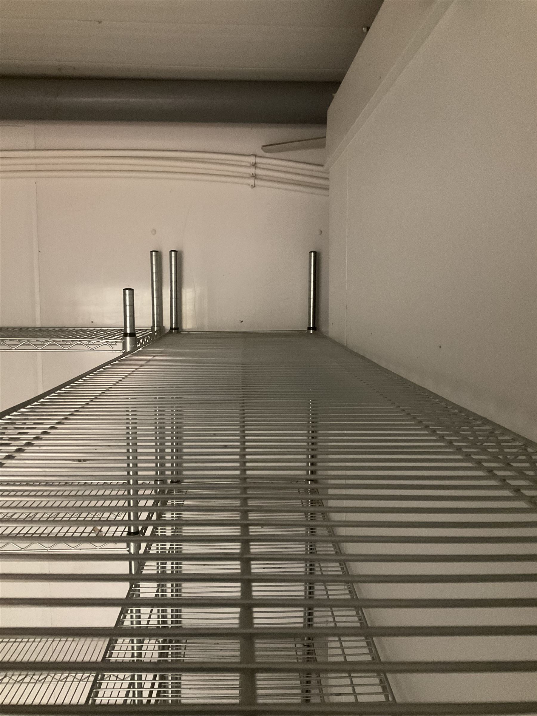 Metal four tier shelving racking x 3, plastic racking and shelving- LOT SUBJECT TO VAT ON THE HAMMER PRICE - To be collected by appointment from The Ambassador Hotel, 36-38 Esplanade, Scarborough YO11 2AY. ALL GOODS MUST BE REMOVED BY WEDNESDAY 15TH JUNE.