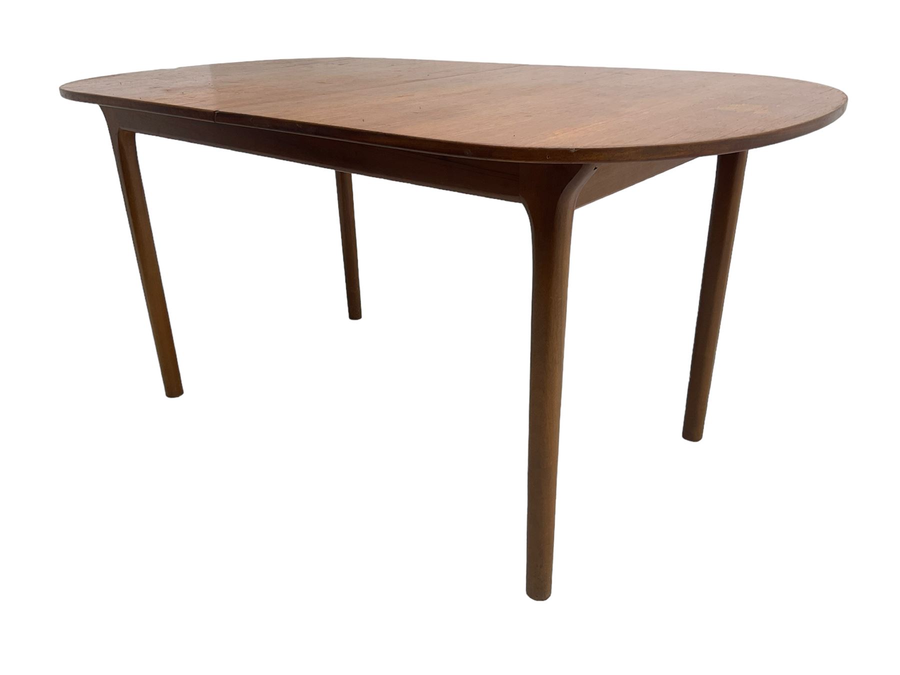 AH McIntosh & Co of Kirkaldy - mid-20th century teak extending dining table, rectangular top with rounded corners, concealed integrated double leaf, raised on tapered supports, 'Furniture by McIntosh sticker to underside of leaf