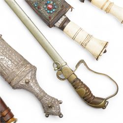 Gurkha Kukri with horn handle and jewelled scabbard, two other Kukris, Arab jambiya Finnish sporting knife with birch handle by Martiini Rovaniemi and German made WWI sword probably for the Turkish market