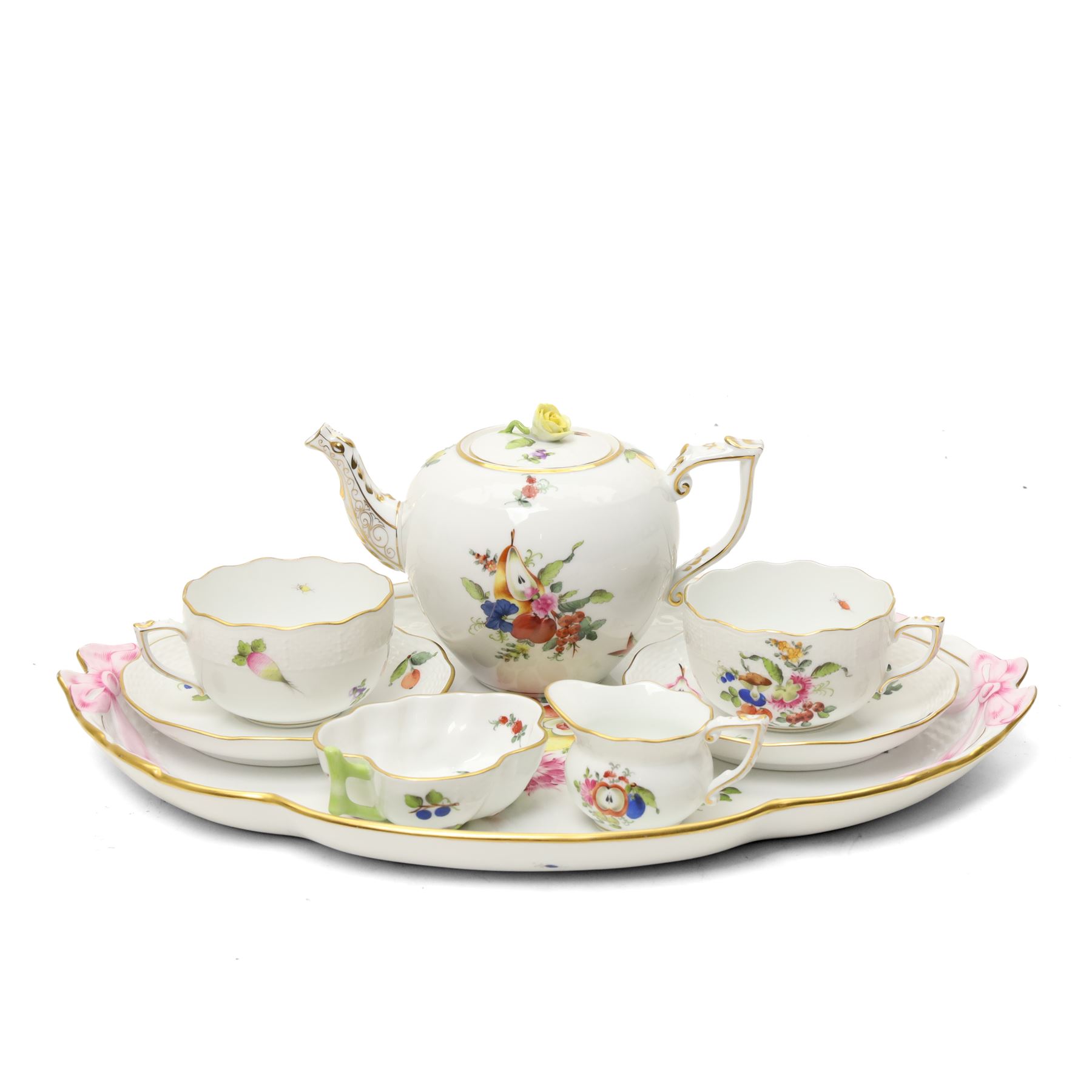 Herend porcelain Tete a Tete decorated with sprays of Spring flowers and scattered leaves etc comprising cabaret tray, two cups and saucers, tea pot, leaf shape bowl and milk jug, some pieces marked Pek Jozsefine