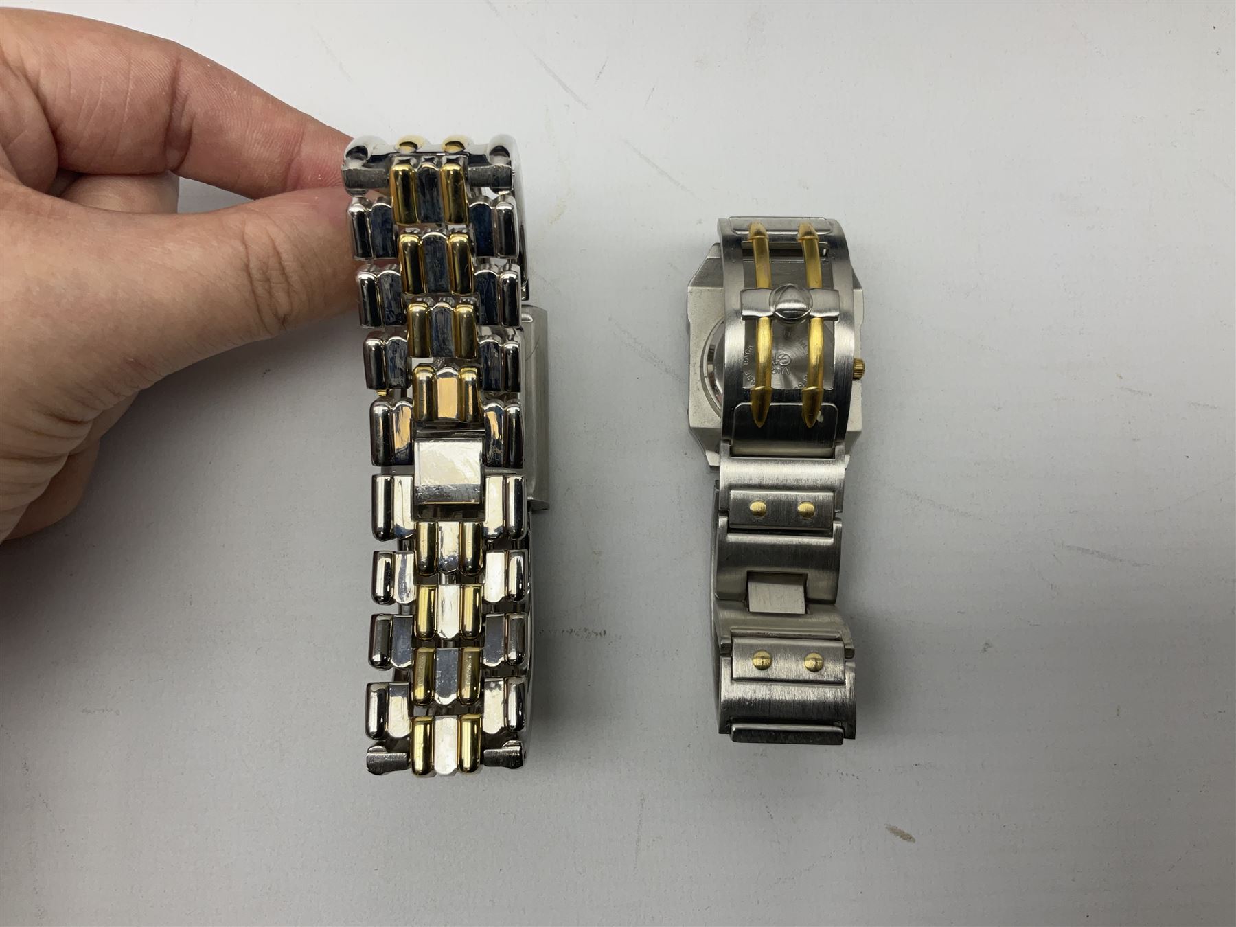 Four X Data stainless steel wristwatches, two Marc Gay wristwatches and one other, all with cover plates