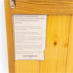 Cotswold & Co - modern light oak dresser, the upper section with open shelving and divided compartments, the base fitted with four drawers over four panelled cupboard doors with metal handles