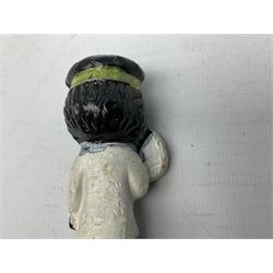 Robinson Jam plaster Golly band, including drummer and singer, H7.5cm

Originally handmade by mothers in Africa for their children from old fabric and cloth, the golly doll was adopted as the mascot and trademark for the Robertson's confectionery brand around 1910 after the company's founder John Robertson visited the US and noticed children playing with them. Robertson's Gollies have been collected by people across the UK and around the world for generations but garnered a contentious image in the 1980s because of links to racism. The trademark was removed from Robertson's branding in 2001.