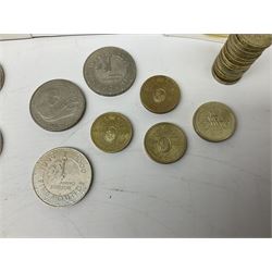 Queen Elizabeth II coinage, including nine five pound coins, eight two pound coins and thirteen old round one pound coins