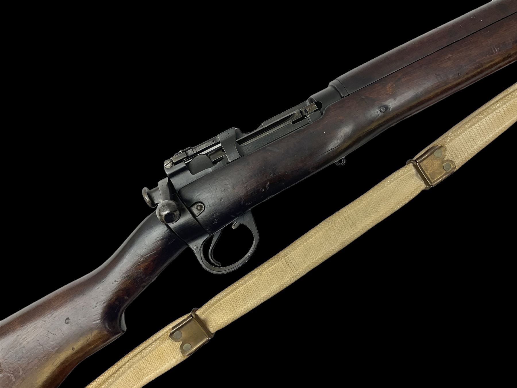 Lee Enfield SMLE .303 No.4 Mk.1* bolt action rifle with 63.5cm barrel and original webbing sling; lacking magazine; No.75C8419; L111cm overall; deactivated to early specification so requires re-deactivation to modern standards SECTION 1 RFD ONLY
