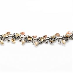 Brett Payne silver and 9ct gold fruiting vine necklace, seventeen links with alternating pears and apples and 9ct gold leaves, Sheffield 1998, boxed