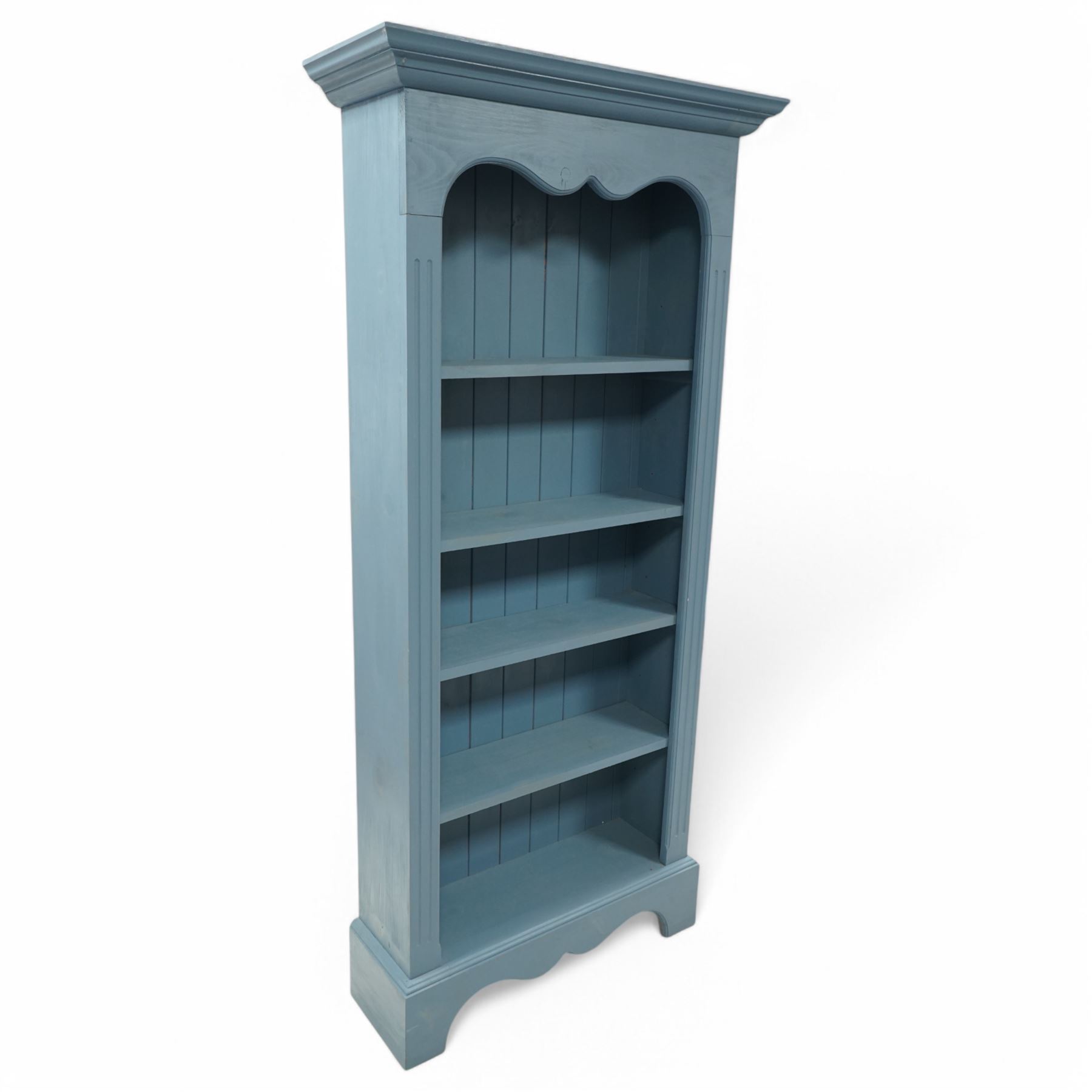 Painted pine open bookcase, projecting cornice over four adjustable shelves, in blue paint finish 