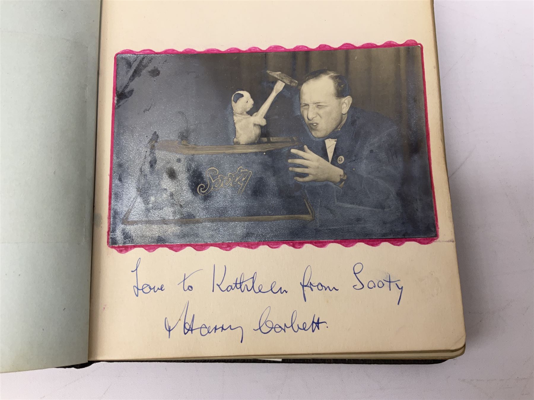 2 autograph albums, containing signatures including Harry Corbett Sooty, Dave Morris, Marion Saunders, Max Bygraves and signed photographs, quantity of postcards depicting the Lords Prayer and playing cards in case