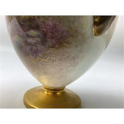 Mid 20th century Royal Worcester twin handled vase and cover decorated by Harry Stinton, the body of ovoid form hand painted with highland cattle against a mountainous landscape, signed H Stinton, upon a circular gilt foot, with black printed marks beneath including shape number 2701, and date code for 1951, H16cm