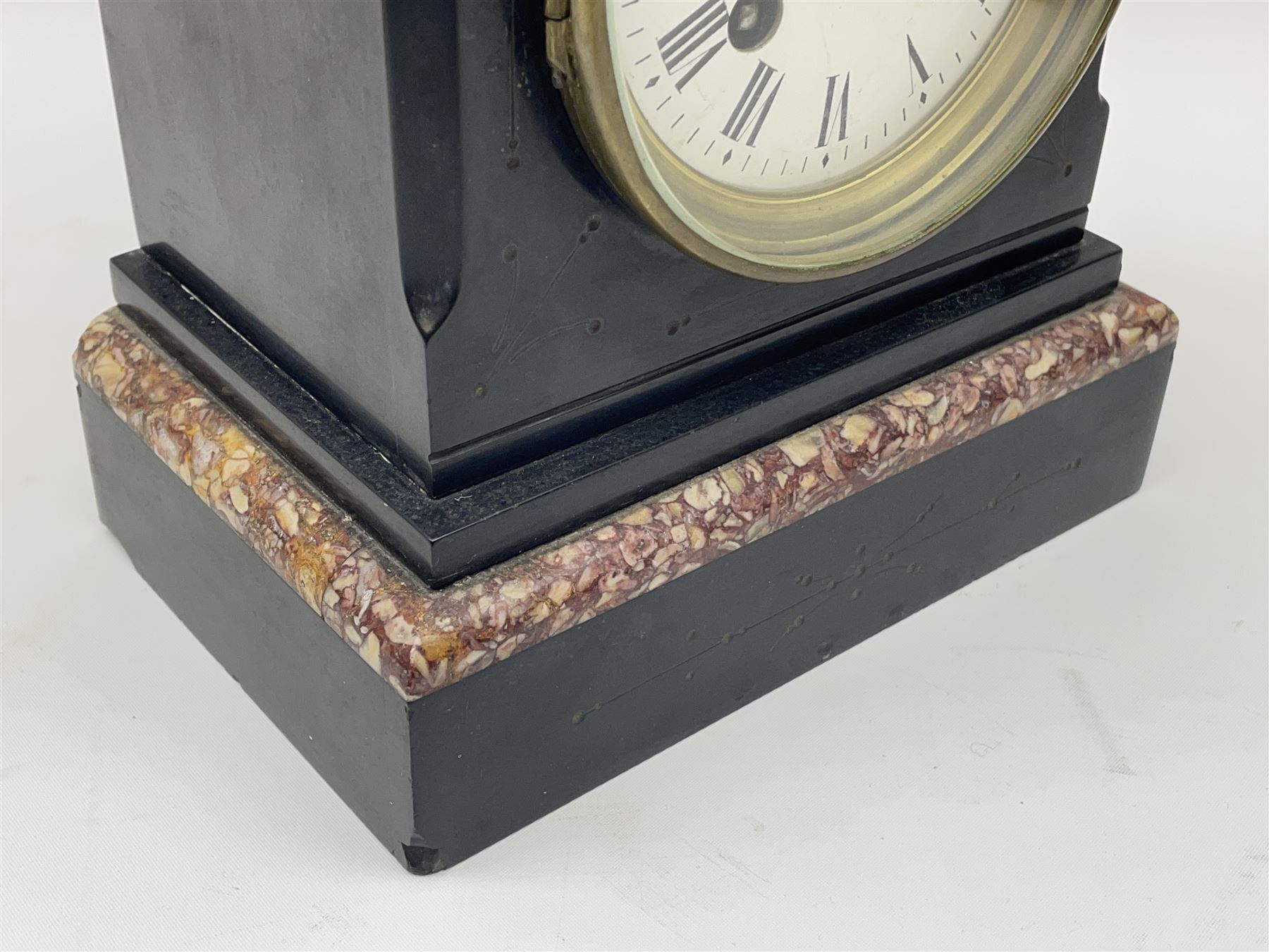 Small Victorian black slate and variegated marble mantel clock, the case with engraved decoration, circular enamel Roman dial, eight day movement by 'Japy Freres' striking the hours and half on bell