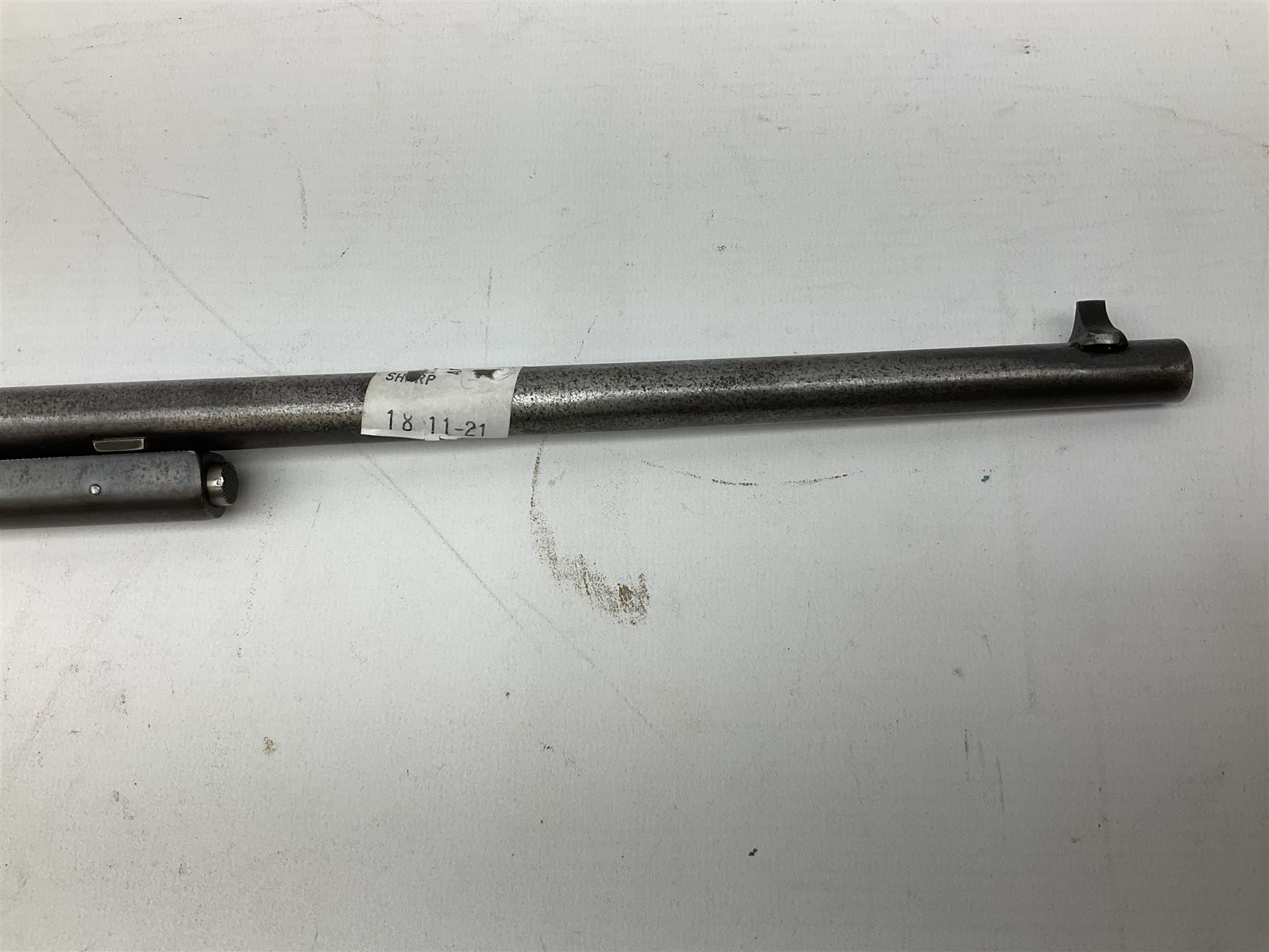 BSA .177 air rifle with top loading under lever action, walnut stock carved with chequered BSA logo to grip, serial no.A1203 L102cm