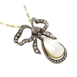 French early 20th century gold and silver pearl and diamond bow pendant, pear shaped blister pearl with old cut and rose cut diamond surround, suspending from a diamond set bow, to an 18ct gold fancy link chain necklace