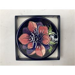 Two Moorcroft pin dishes decorated in the 'Anemone' pattern, with stamped marks beneath, D11.5cm, both boxed