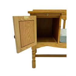 Light oak telephone table, with cupboard, upholstered seat