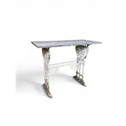 Victorian ornate cast iron garden table, trefoil base with central enclosed column, circular top with later marble, with registration mark