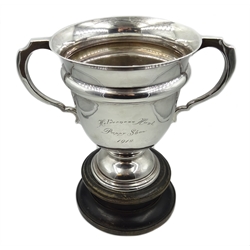  Silver trophy cup engraved 'Holderness Hunt Puppy Show 1912' by Walker & Hall Sheffield 1911, 20cm high on ebonised plinth, 23oz  