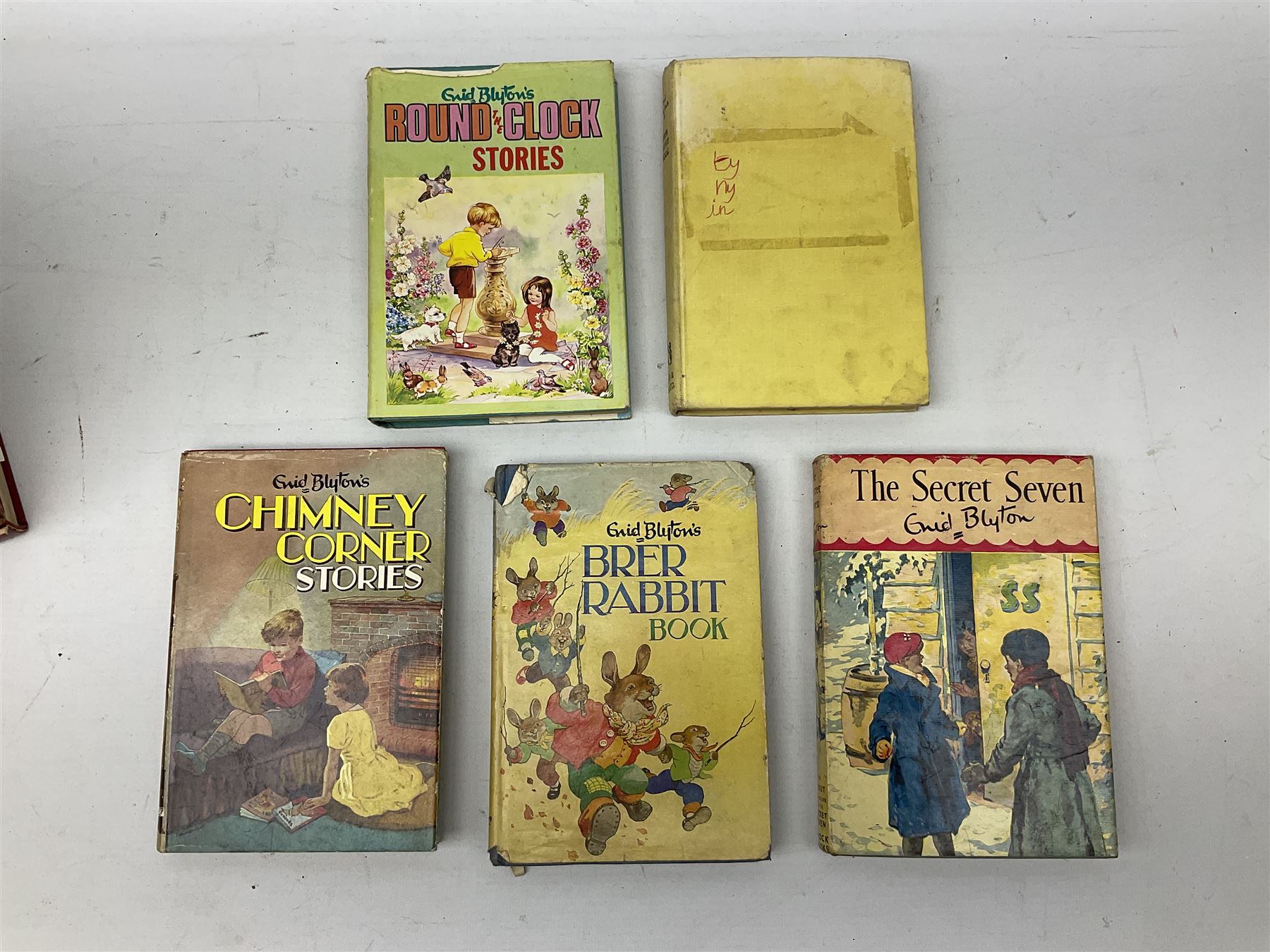Nine books by Captain W.E Johns, including 'Biggles works it out', Biggles at World's End', 'Biggles in Australia', 'Biggles Presses on' etc, together with Enid Blyton books and other children's books 