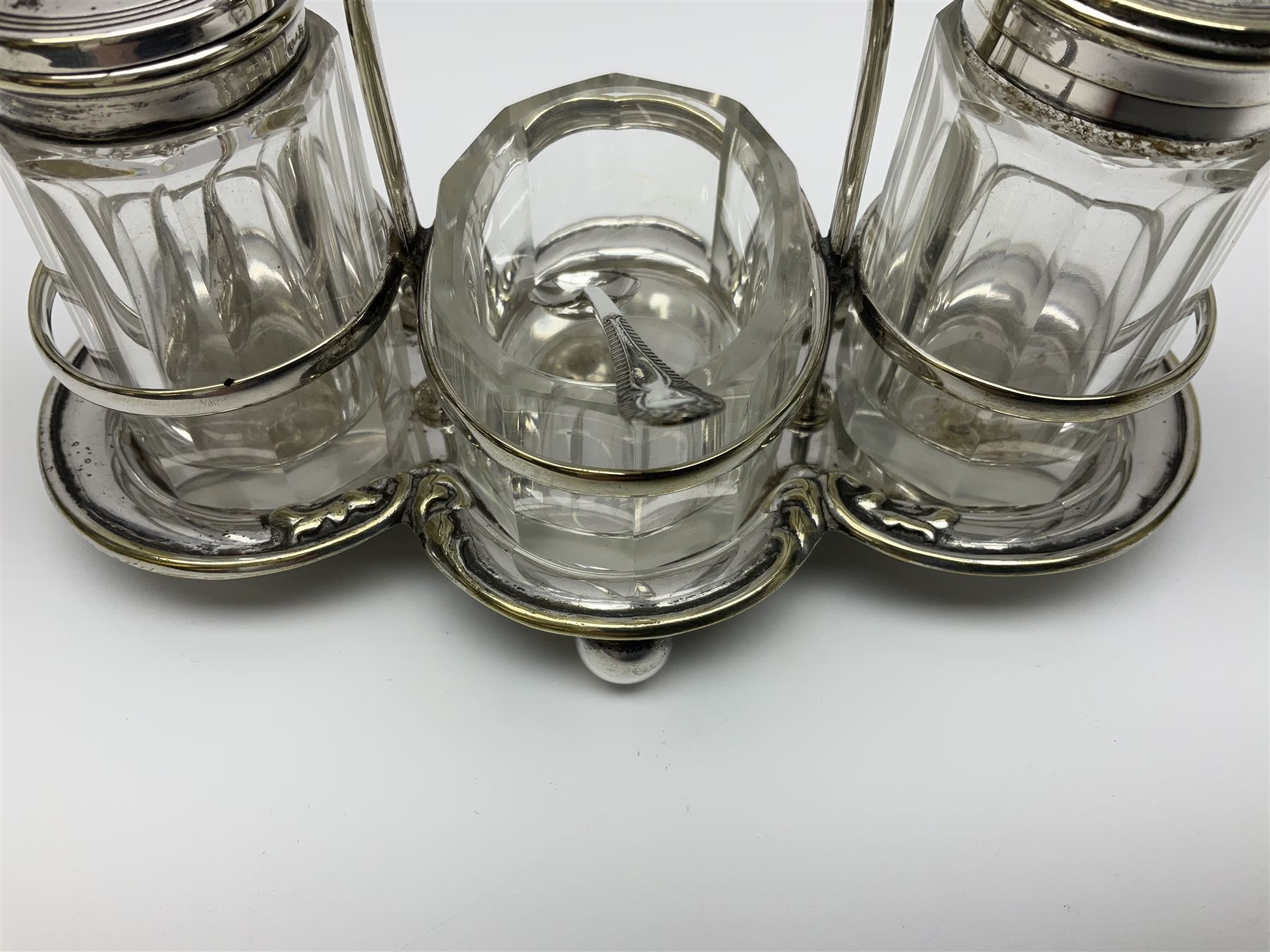 Sheffield silver-plated cruet set, comprising mustard pot, open glass salt and pepper pot on stand, together with a collection of silver plated spoons
