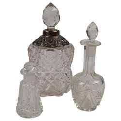 Silver mounted hand mirror, hallmarked together with silver mounted scent bottle and four other glass bottles