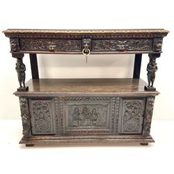 Victorian carved oak buffet sideboard, rectangular moulded top over a leaf and egg and dart cornice, two drawers with scroll acanthus leaf and mask carved fronts, two figures carved supports, one depicting a piper and one a flute player, the lower section with central panelled door with relief carved tavern scene flanked by two further carved panels
