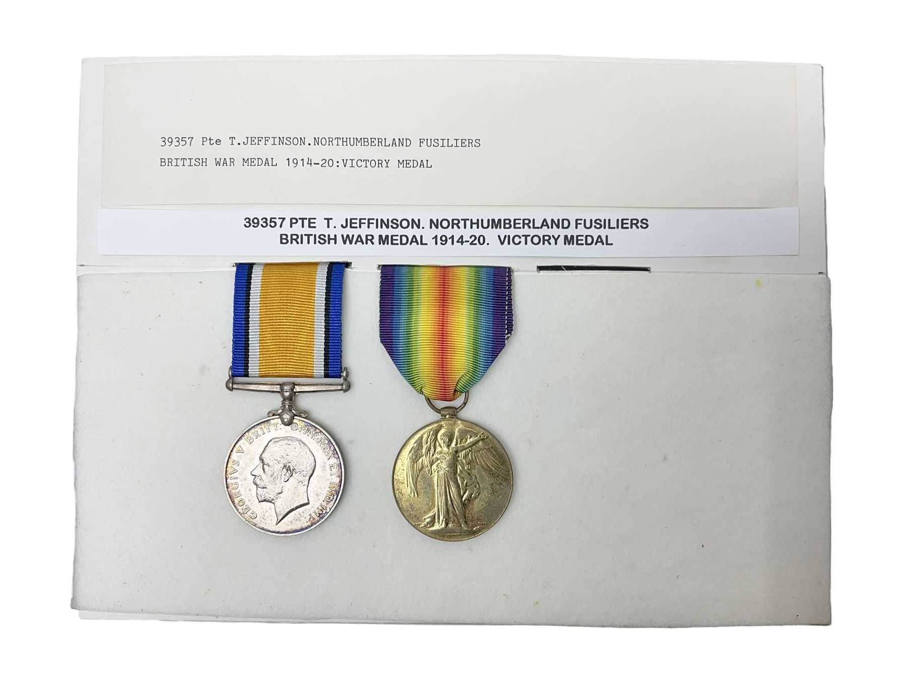 WWI pair of medals comprising British War Medal and Victory Medal awarded to 39357 Pte. T. Jeffinson Northumberland Fusiliers; both with ribbons (2)