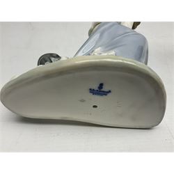 Six Lladro figures, comprising Naughty Dog no 4982, Best Friend 7620 and My Buddy no 7609, Kitty Confrontation no 1442, It Wasn't Me no 7672 and Rabbit Eating no 4772, three with original boxes, largest example H22cm