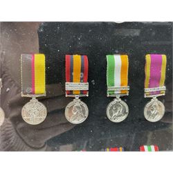 Limited edition large framed display board with sixty half-size copies of British Gallantry and Campaign Medals produced by Danbury Mint; all with ribbons and associated booklet
