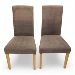 Contemporary pine farmhouse table and four chairs, rectangular top with rounded corners and waxed finish, raised on turned legs painted in terracotta red, set of four contemporary dining chairs, fully upholstered in taupe microfibre fabric with gently flared backs, on square section oak effect legs