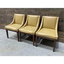 3 x walnut framed dining chairs, upholstered in a dark beige leather