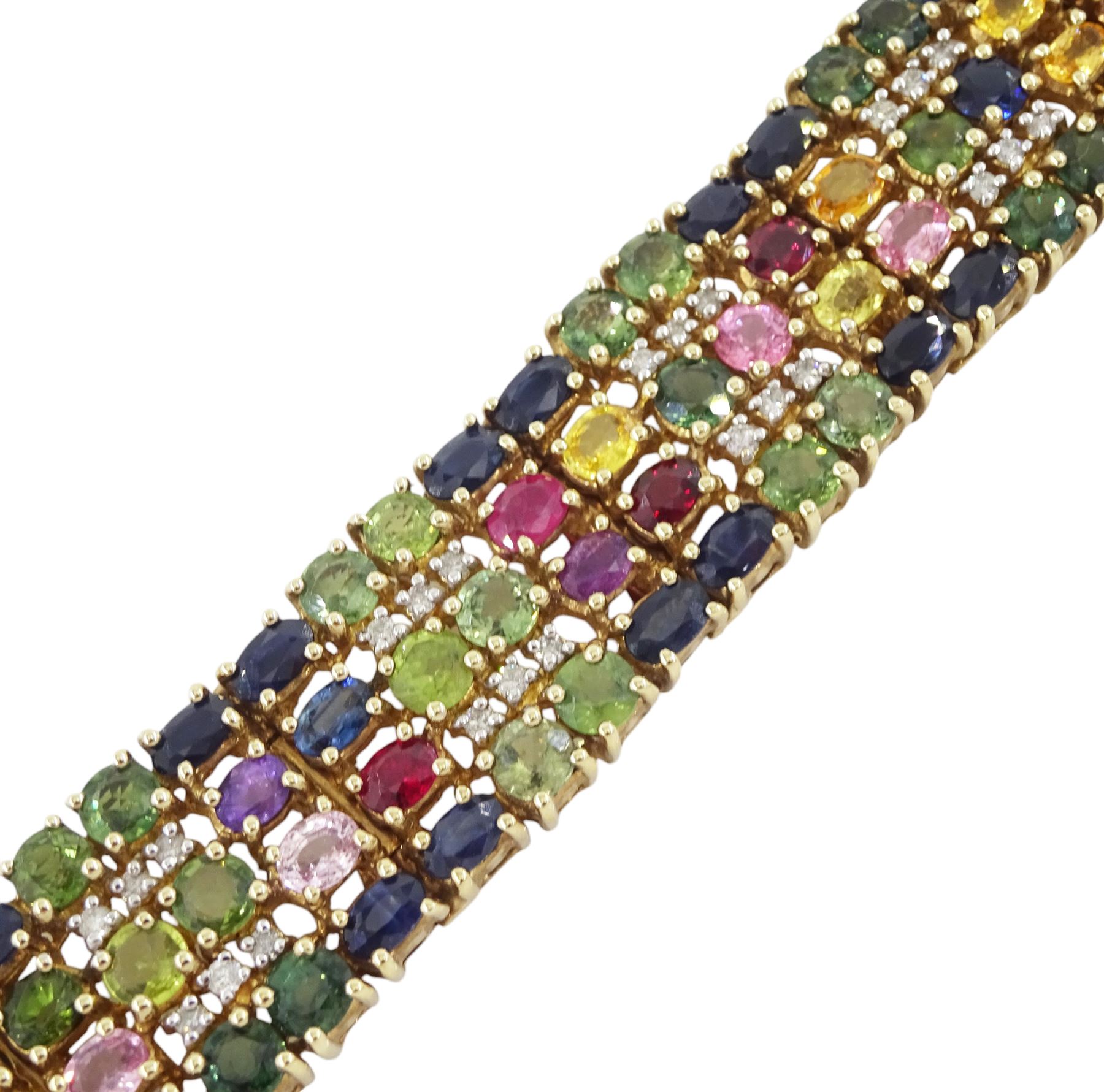9ct gold sapphire, ruby and diamond bracelet, vari-cut blue fancy coloured sapphires, oval cut rubies and round brilliant cut diamonds, Birmingham 2006