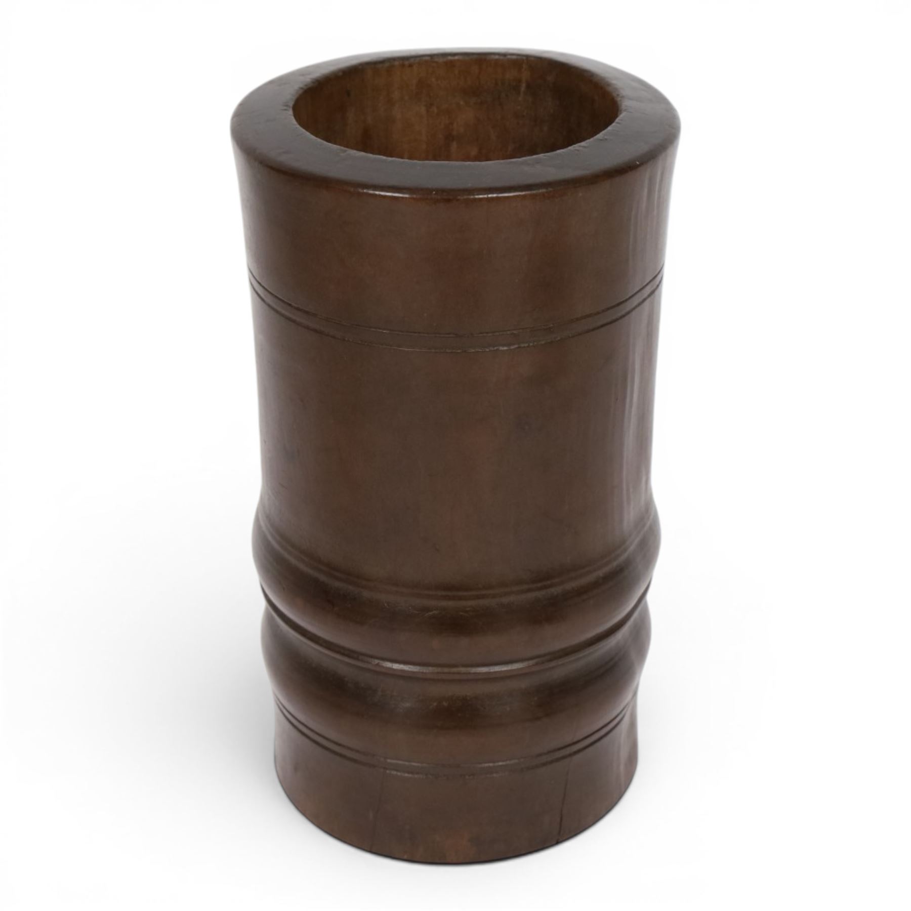 18th century turned fruitwood mortar, of tall proportions and cylindrical form with ring turned and moulded detail, 22.5cm 