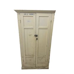 Painted pine cupboard or wardrobe, two panelled doors enclosing three shelves