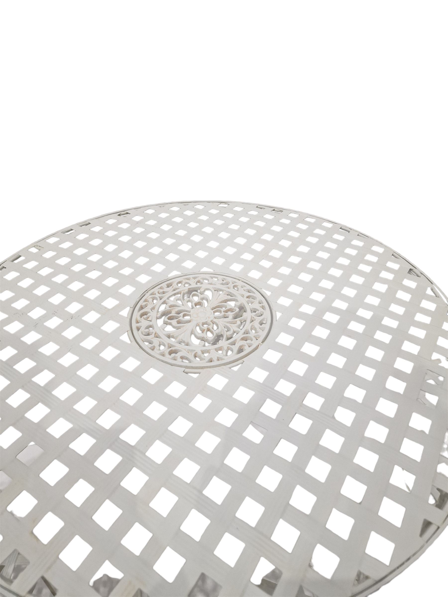 Wrought iron mesh style round bistro table and two chairs in white finish  - THIS LOT IS TO BE COLLECTED BY APPOINTMENT FROM DUGGLEBY STORAGE, GREAT HILL, EASTFIELD, SCARBOROUGH, YO11 3TX