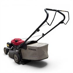 Honda -  GCV160 petrol lawnmower, Izy model, with rear grass collector, grey deck and red engine cover.