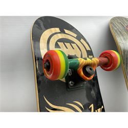 Three skateboards, including Santa Cruz example, together with a collection of wheels, including Spitfires, trucks and other accessories
