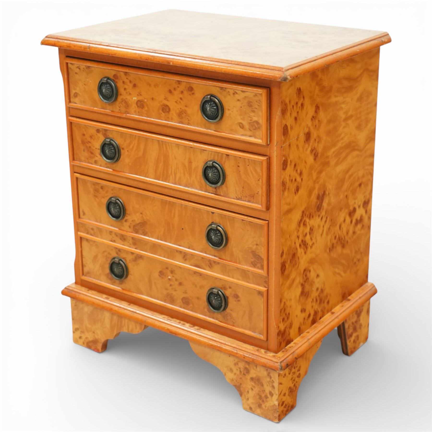 20th century burr walnut reproduction chest, rectangular moulded top over three long drawers, each fitted with circular ring handles, plain sides, raised on shaped bracket feet