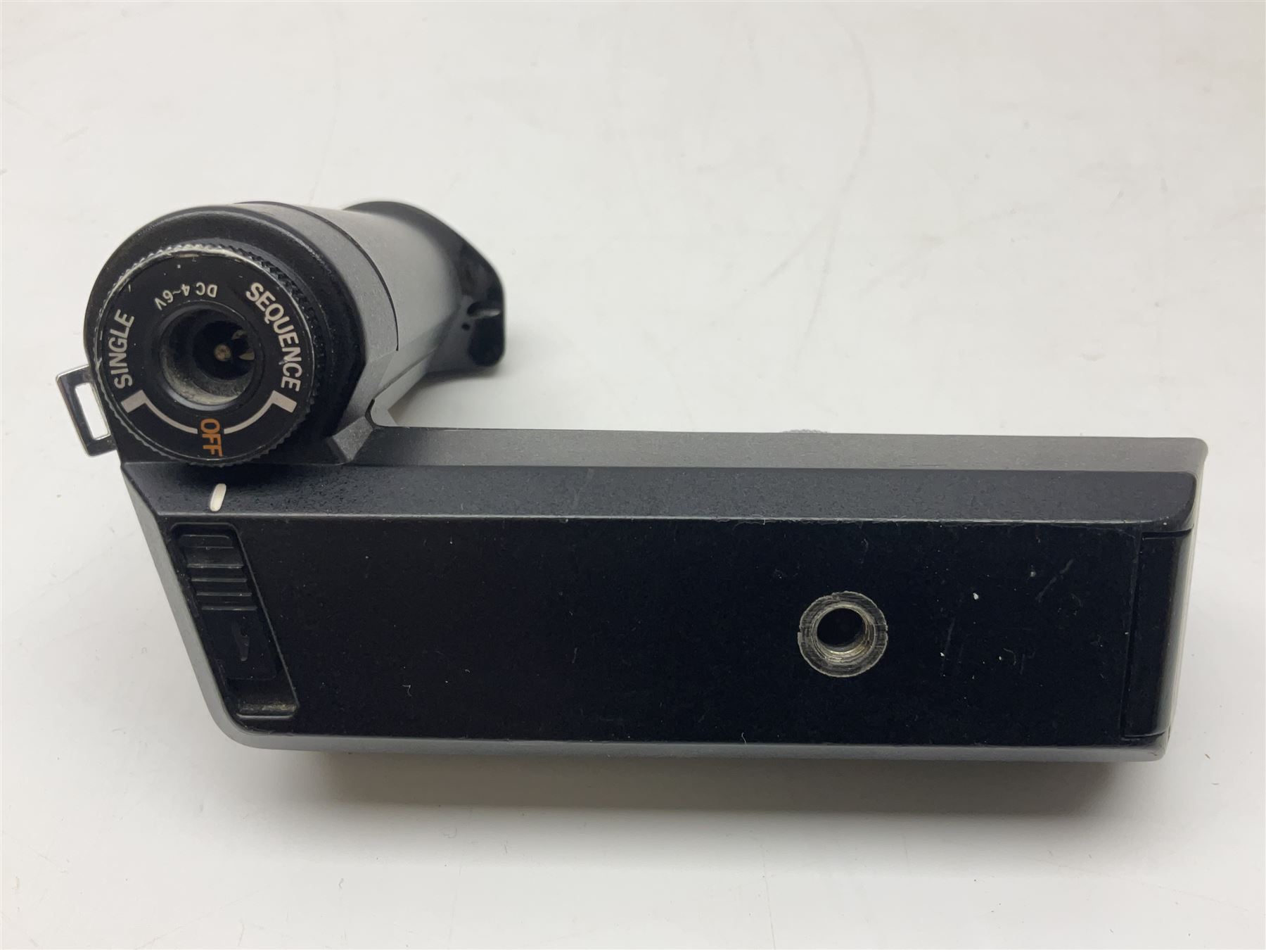 Olympus OM-1 camera body, serial no 913212, with 'Olympus OM-System F.Zuiko Auto-S 1:1.8 f=50mm' lens, serial no.74374, 'Vivitar wide angle MC 28mm 1:2.8 49mm' lens, serial no. 42042268, and Olympus OM winder 2