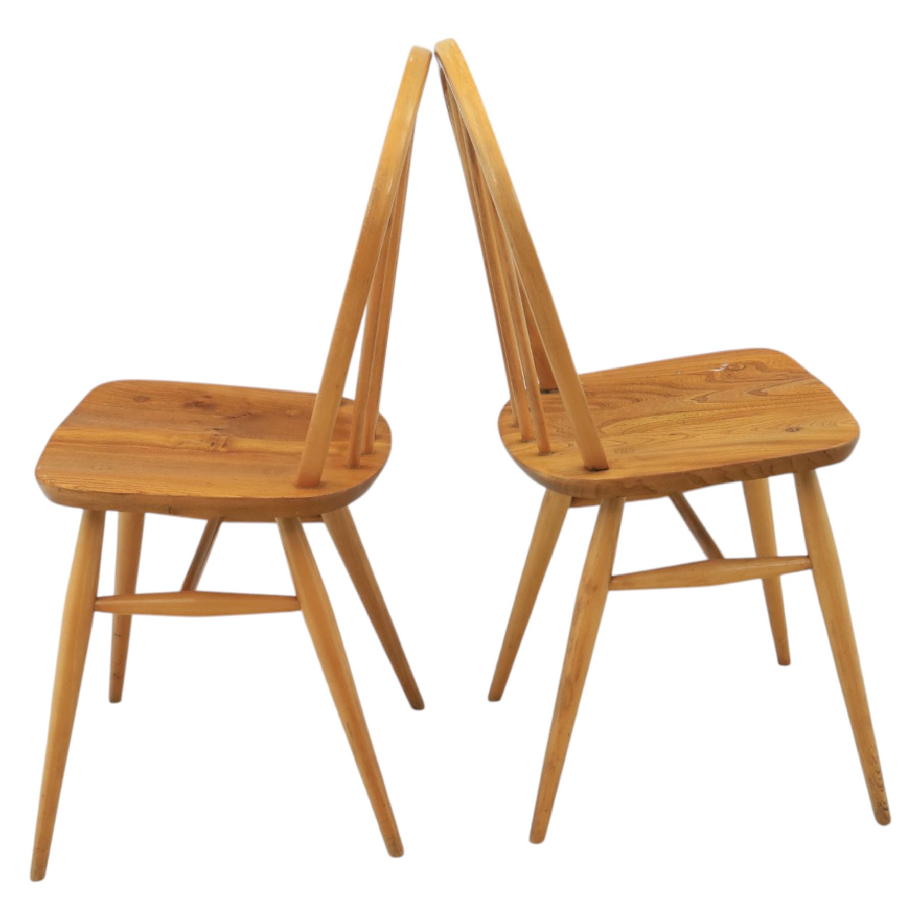 Ercol - set of four 'Windsor' waxed elm chairs, with hoop back design, on tapering supports